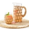 Hand-Woven Cane Pitcher | 1 2 Hand-Woven Cane Pitcher | 1 -Grocery Store hand woven cane pitcher c 2